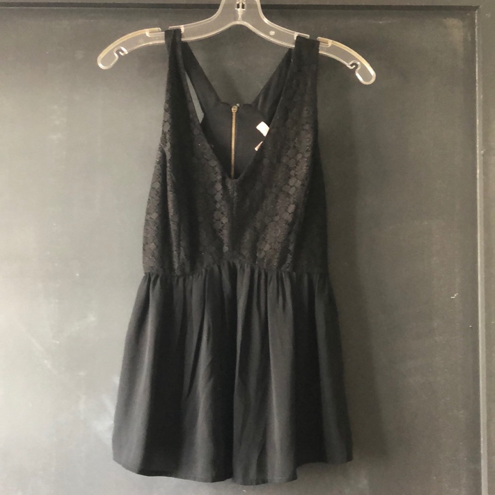 Black sleeveless blouse